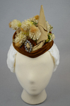 Toque, oval shape with cream ribbon, brown velvet, and artificial flowers, 1890s, front view by Irma G. Bowen Historic Clothing Collection