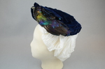 Toque, blue velvet with rhinestones and feathers, 1890s, left side view by Irma G. Bowen Historic Clothing Collection