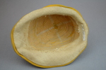 Cloche, yellow silk with raffia accents, 1920s, interior view by Irma G. Bowen Historic Clothing Collection