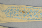 Stockings, cream cotton with blue embroidery, 1880s, detail of embroidery