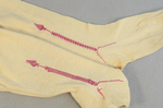 Stockings, cream cotton with red embroidered clocks, 1840s-1850s, back and front embroidery comparison by Irma G. Bowen Historic Clothing Collection