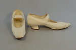 Shoes, white kidskin with strap, 1934, side and front view by Irma G. Bowen Historic Clothing Collection