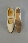 Shoes, white kidskin with strap, 1934, top and sole view by Irma G. Bowen Historic Clothing Collection