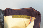 Boots, purple faille high-button, 1880s-1900s, detail of fabric label by Irma G. Bowen Historic Clothing Collection