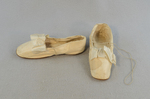 Shoes, white satin evening slippers, 1860-1870, side and front view by Irma G. Bowen Historic Clothing Collection