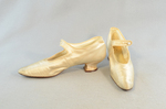 Shoes, white satin with strap, 1920s, side and front view by Irma G. Bowen Historic Clothing Collection