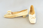 Shoes, white kidskin slippers with pinked bow, 1860s, side and front view by Irma G. Bowen Historic Clothing Collection