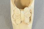 Shoes, white kidskin slippers with pinked bow, 1860s, detail of bow by Irma G. Bowen Historic Clothing Collection