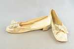 Shoes, white kidskin slippers with ribbon bow, 1860s-1870s, side and front view by Irma G. Bowen Historic Clothing Collection