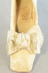 Shoes, white kidskin slippers with ribbon bow, 1860s-1870s, detail of bow by Irma G. Bowen Historic Clothing Collection