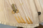 Pink silk corset, 1890-1905, detail of petticoat hook and flossing