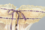 Pink silk corset, 1890-1905, detail of lace with ribbon by Irma G. Bowen Historic Clothing Collection