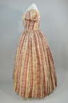 Dress, red and cream striped printed cotton, c. 1850s, side view by Irma G. Bowen Historic Clothing Collection