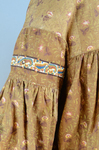 Housedress, brown printed cotton, c. 1835-1850, detail of yoke and sleeve piping, trim, gathers, and sleeve piecing by Irma G. Bowen Historic Clothing Collection