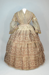 Dress, fan-front bodice and tiered skirt, of printed barege, 1850s, front view by Irma G. Bowen Historic Clothing Collection
