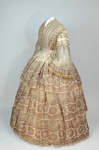 Dress, fan-front bodice and tiered skirt, of printed barege, 1850s, side view by Irma G. Bowen Historic Clothing Collection