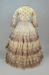 Dress, paisley-printed mull with fan-front bodice and tiered skirt, 1863, back view by Irma G. Bowen Historic Clothing Collection