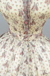 Dress, paisley-printed mull with fan-front bodice and tiered skirt, 1863, detail of front waist