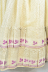 Walking dress, three pieces with bodice, skirt, and sash, beige barege with purple stripes and leaves, 1860s, detail of flounce by Irma G. Bowen Historic Clothing Collection