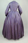 Dress, purple silk with silver, black, and pink stripes, c. 1865, back view by Irma G. Bowen Historic Clothing Collection