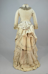 Dress, light gray silk faille with steel blue trim, 1870s, back view by Irma G. Bowen Historic Clothing Collection