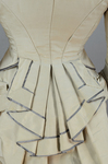 Dress, light gray silk faille with steel blue trim, 1870s, detail of peplum
