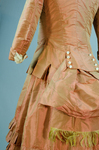 Girl’s dress, salmon and maroon silk taffeta check with bustle, 1880s, detail of bustle and cuff by Irma G. Bowen Historic Clothing Collection