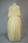 Duster, cream silk with dolman sleeves, 1880s, back view