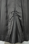Dress, black ribbed double-faced satin trimmed with reverse side, 1910-1915, detail of skirt by Irma G. Bowen Historic Clothing Collection