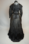 Mourning dress, striped black silk with black embroidered appliqués, c. 1900, back view by Irma G. Bowen Historic Clothing Collection