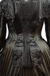 Mourning dress, striped black silk with black embroidered appliqués, c. 1900, detail of back by Irma G. Bowen Historic Clothing Collection