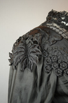 Mourning dress, striped black silk with black embroidered appliqués, c. 1900, detail of shoulder