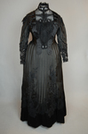 Mourning dress, striped black silk with black embroidered appliqués, c. 1900, front view by Irma G. Bowen Historic Clothing Collection