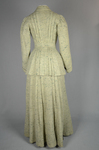 Suit, green tweed, with hip-length jacket and ankle-length skirt, c. 1912, back view by Irma G. Bowen Historic Clothing Collection