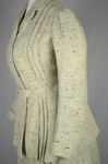 Suit, green tweed, with hip-length jacket and ankle-length skirt, c. 1912, detail of pleats by Irma G. Bowen Historic Clothing Collection