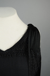 Evening gown, sleeveless, pin-tucked black crepe with long black cord tassels, 1930s, detail of cord neckline by Irma G. Bowen Historic Clothing Collection