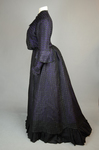 Dress, black silk open weave over purple silk taffeta, c. 1902, side view by Irma G. Bowen Historic Clothing Collection