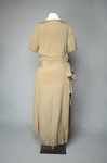 Dress, taupe silk crepe with short sleeves and overskirt embroidered with cord and gold beads, c. 1920, back view by Irma G. Bowen Historic Clothing Collection