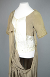Dress, taupe silk crepe with short sleeves and overskirt embroidered with cord and gold beads, c. 1920, open bodice by Irma G. Bowen Historic Clothing Collection