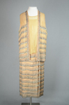 Sheath dress with vest, sleeveless, pale gold and tangerine chiffon with rows of bugle beads, c. 1923, front view by Irma G. Bowen Historic Clothing Collection