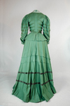 Suit, green wool with braid and velvet, c. 1906, back view by Irma G. Bowen Historic Clothing Collection