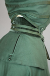 Suit, green wool with braid and velvet, c. 1906, detail of full bodice waistband