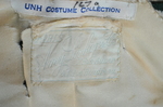 Suit, green wool with braid and velvet, c. 1906, detail of label by Irma G. Bowen Historic Clothing Collection