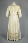 Dress, white silk with embroidery and fringe, 1910s, back view by Irma G. Bowen Historic Clothing Collection