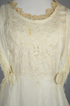 Dress, white silk with embroidery and fringe, 1910s, detail of bodice embroidery by Irma G. Bowen Historic Clothing Collection
