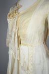 Dress, white silk with embroidery and fringe, 1910s, detail of dress opening by Irma G. Bowen Historic Clothing Collection