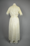 Dress, machine embroidered white muslin with a lace yoke and sleeves, c. 1905-1910, back view by Irma G. Bowen Historic Clothing Collection