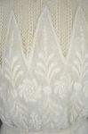 Dress, machine embroidered white muslin with a lace yoke and sleeves, c. 1905-1910, detail of bodice by Irma G. Bowen Historic Clothing Collection