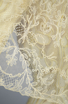 Evening gown, pale yellow faille with Chantilly lace and a bobbinet overlay appliquéd with Art Nouveau lilies, c. 1905, detail of Chantilly lace by Irma G. Bowen Historic Clothing Collection