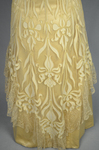 Evening gown, pale yellow faille with Chantilly lace and a bobbinet overlay appliquéd with Art Nouveau lilies, c. 1905, detail of skirt by Irma G. Bowen Historic Clothing Collection